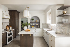 ballston kitchen remodeling company project with island, custom cabinetry, updated counters, and pendant lighting