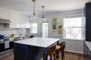 Kitchen remodeling Arlington VA project with island, pendant lighting, and updated cabinetry